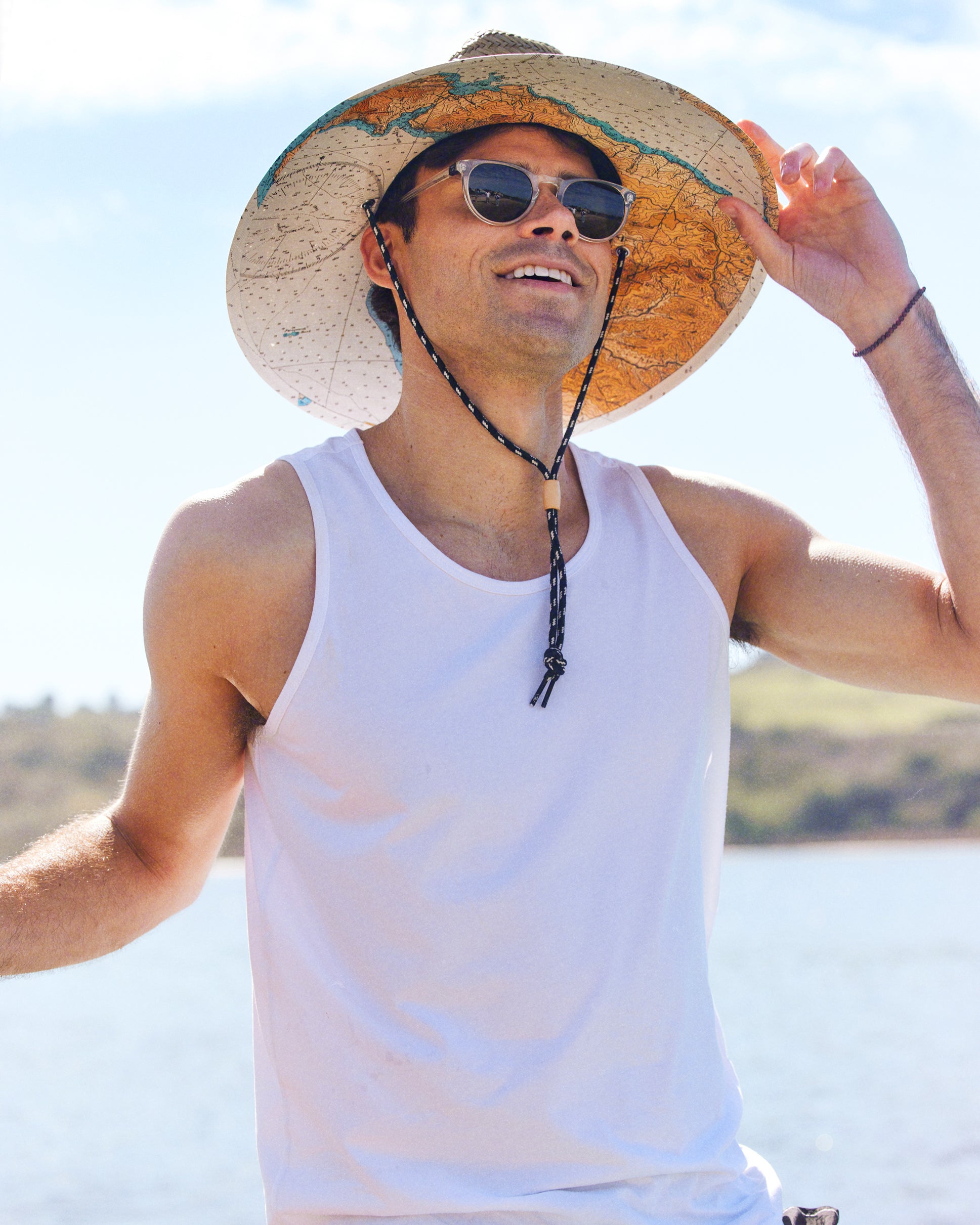 Hemlock male model wearing the UPF50+ Lifeguard Straw Hat Latitude print