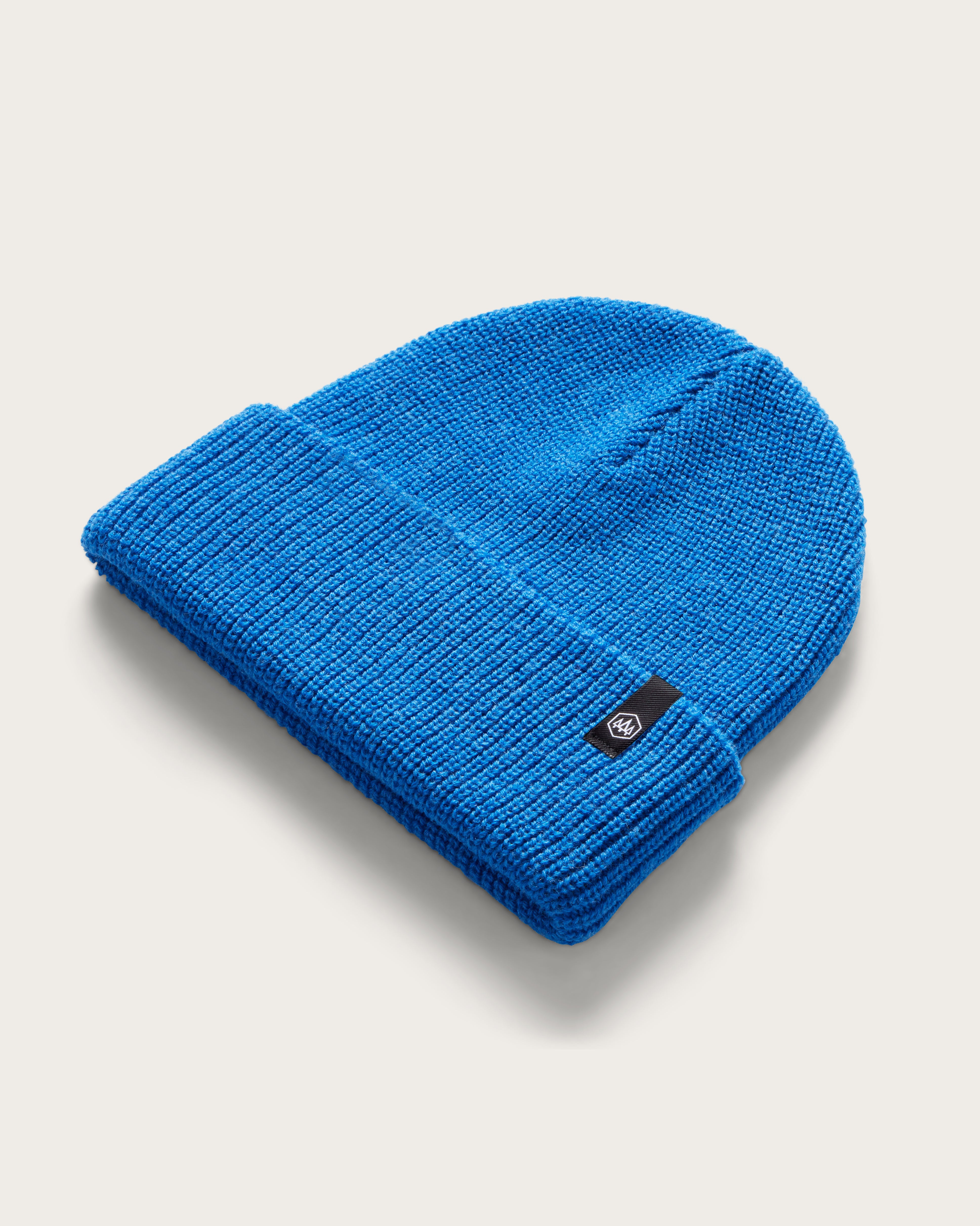 Hemlock Baby Ranger Beanie in Cobalt color at an angle