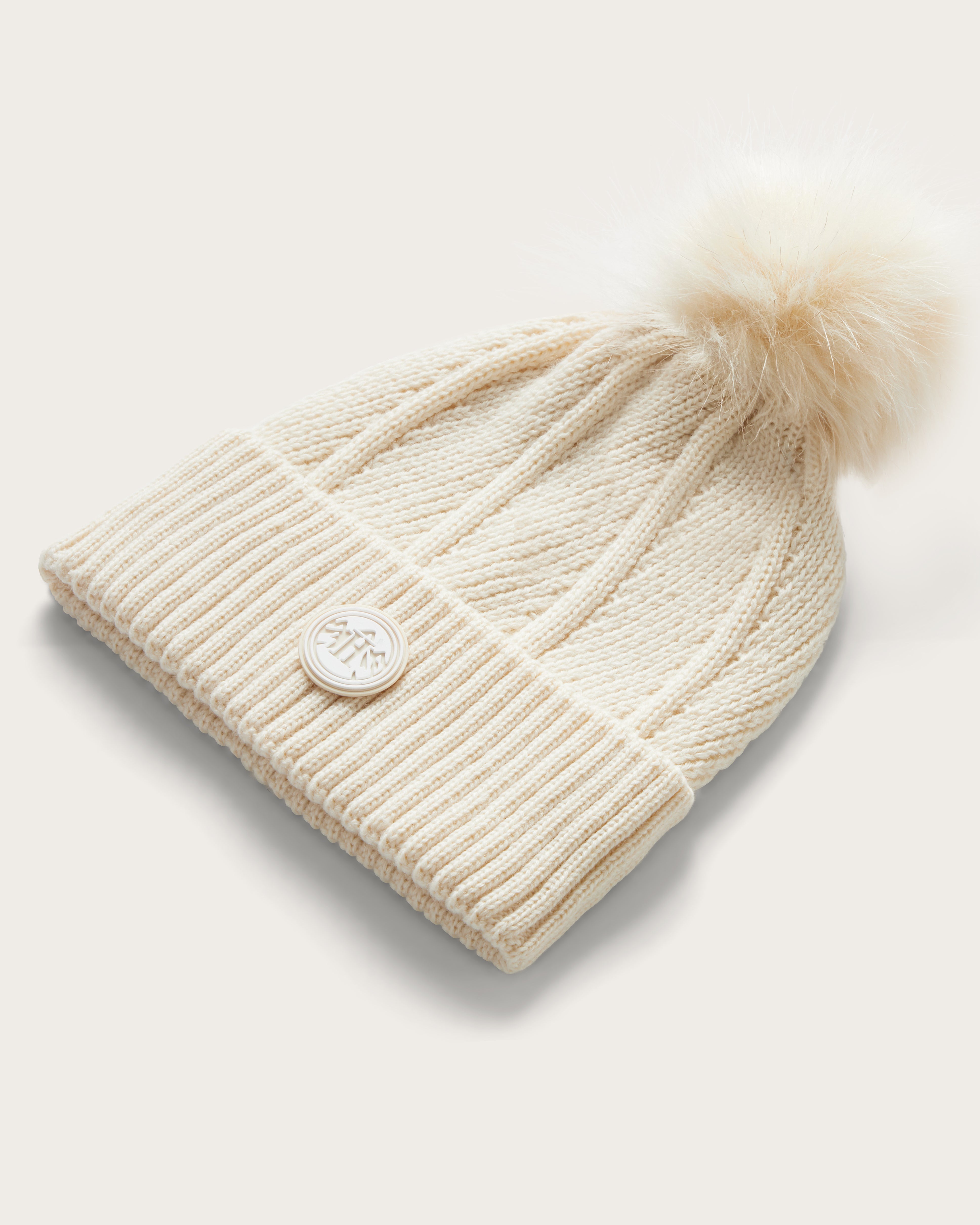 Hemlock Baby Willow Pom Beanie in White with white pom at an angle