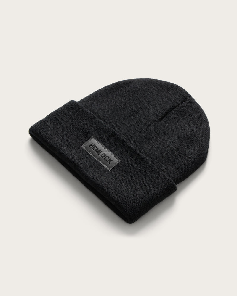 Hemlock Beacon Beanie in Black at an angle