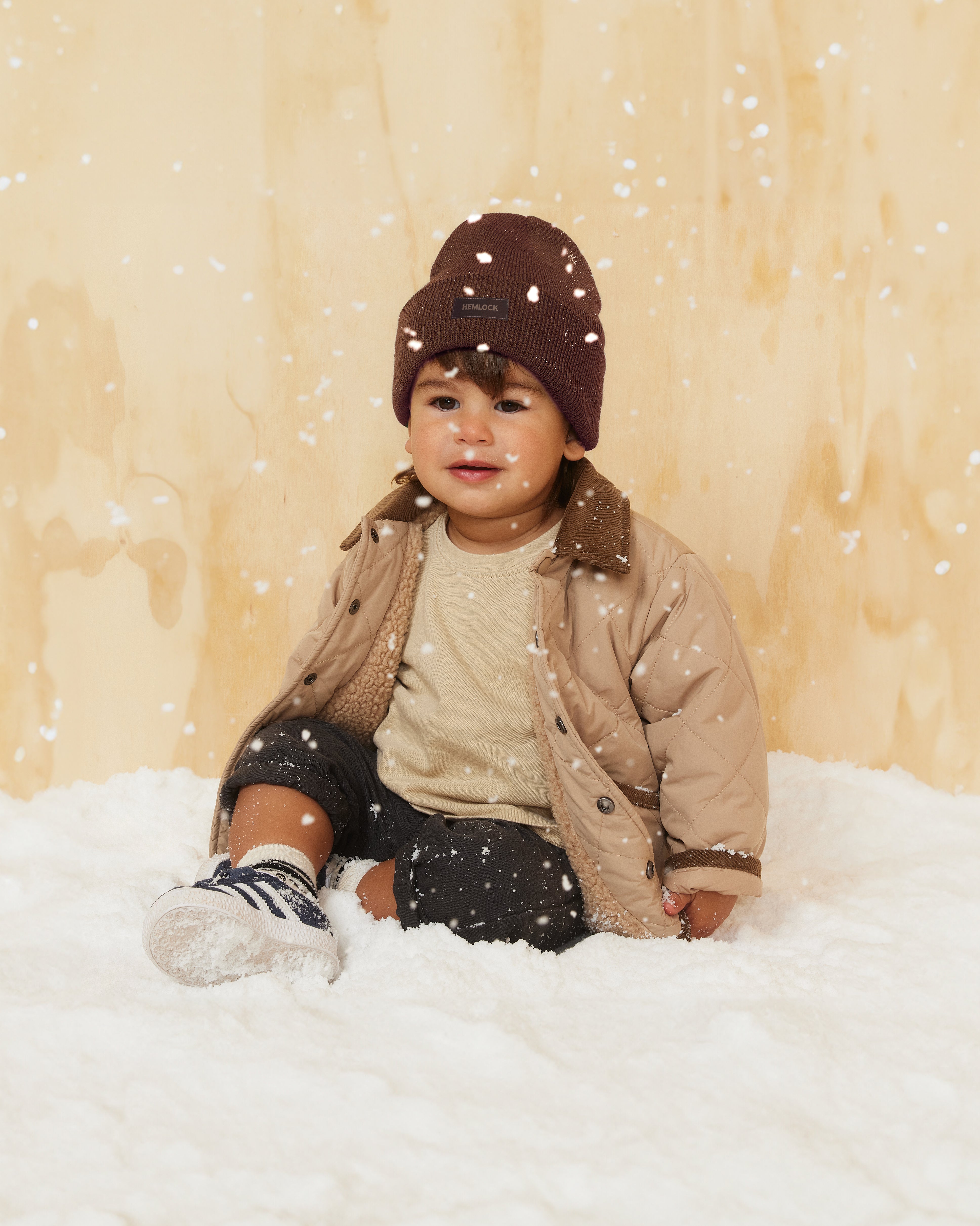 Hemlock boy model wearing the Toddler Beacon Beanie in Mocha 