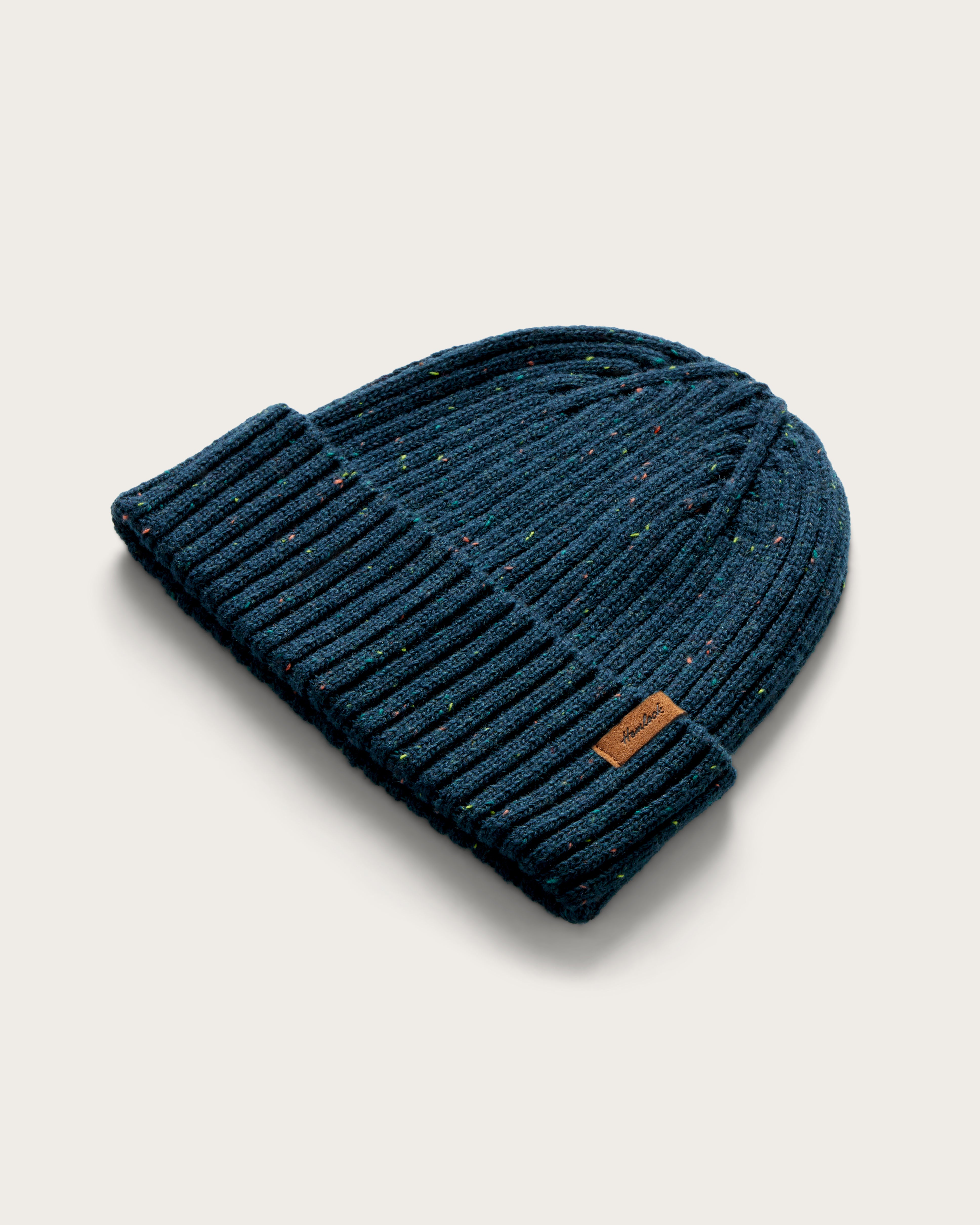 Hemlock Hawthorne Fleck Beanie in Dark Teal at an angle