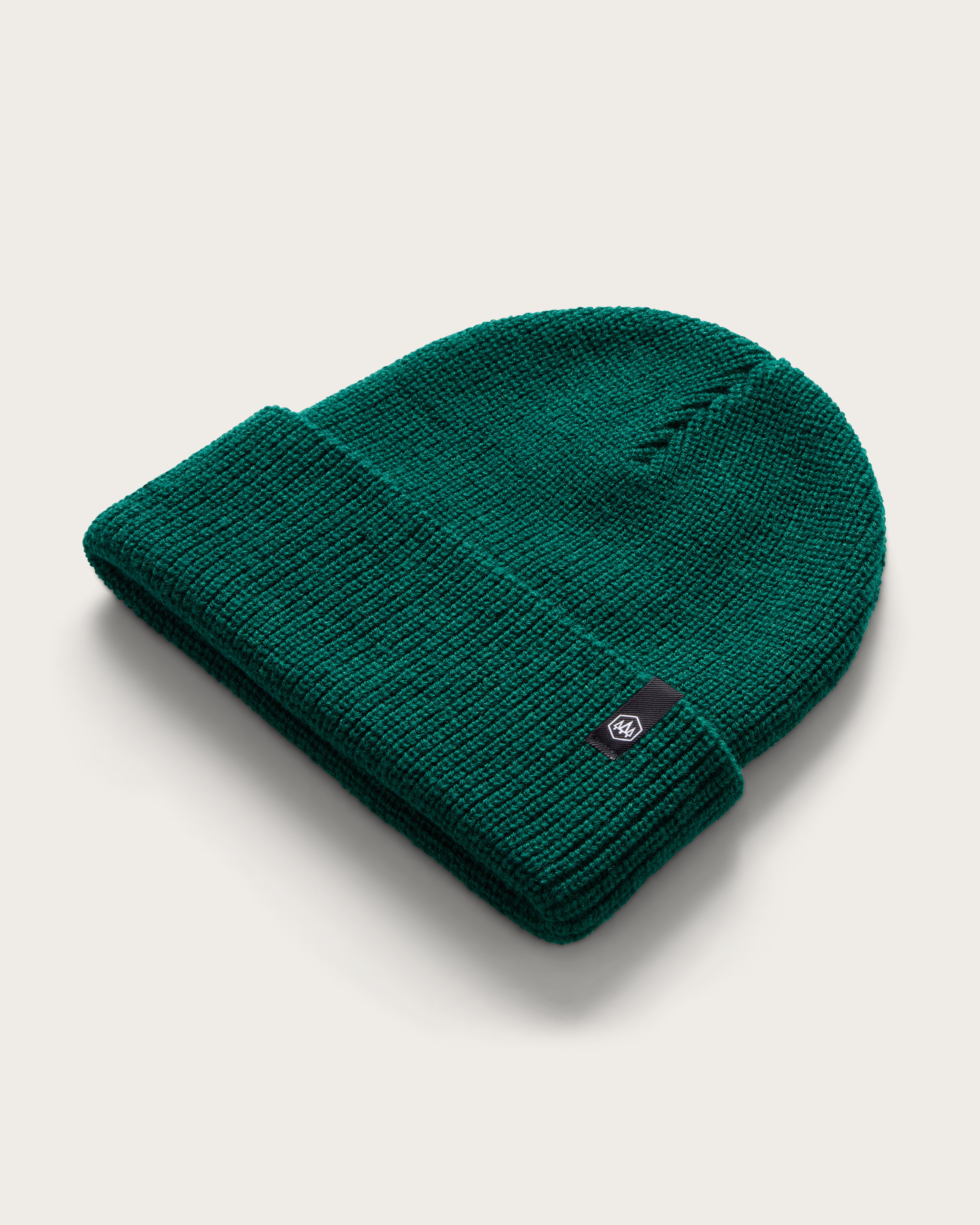 Hemlock Baby Ranger Beanie in Emerald at an angle