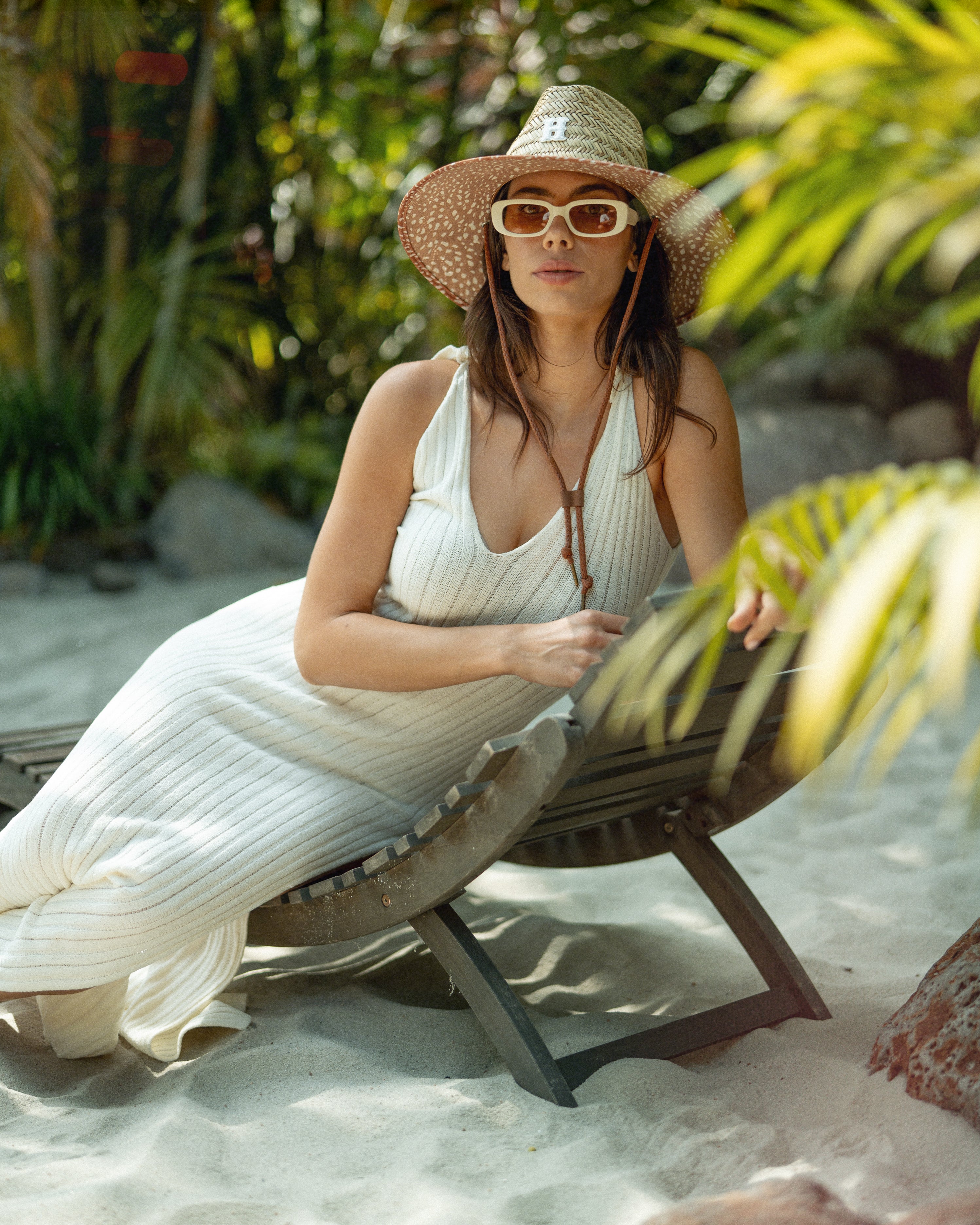 Hemlock female model wearing the UPF50+ Lifeguard Straw Hat in Deer Sport print 