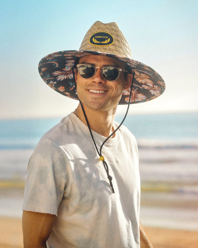 Hemlock male model wearing the UPF50+ Lifeguard Straw Hat Flying Fish print