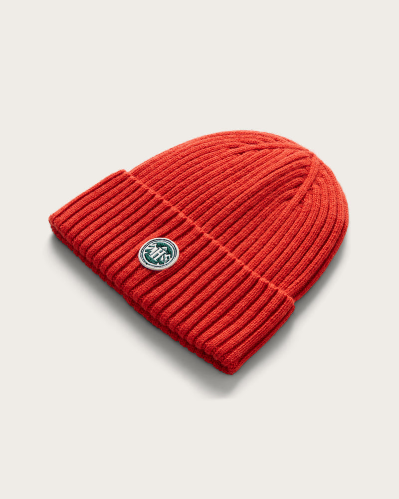 Hemlock Peak Beanie in Flame color at an angle