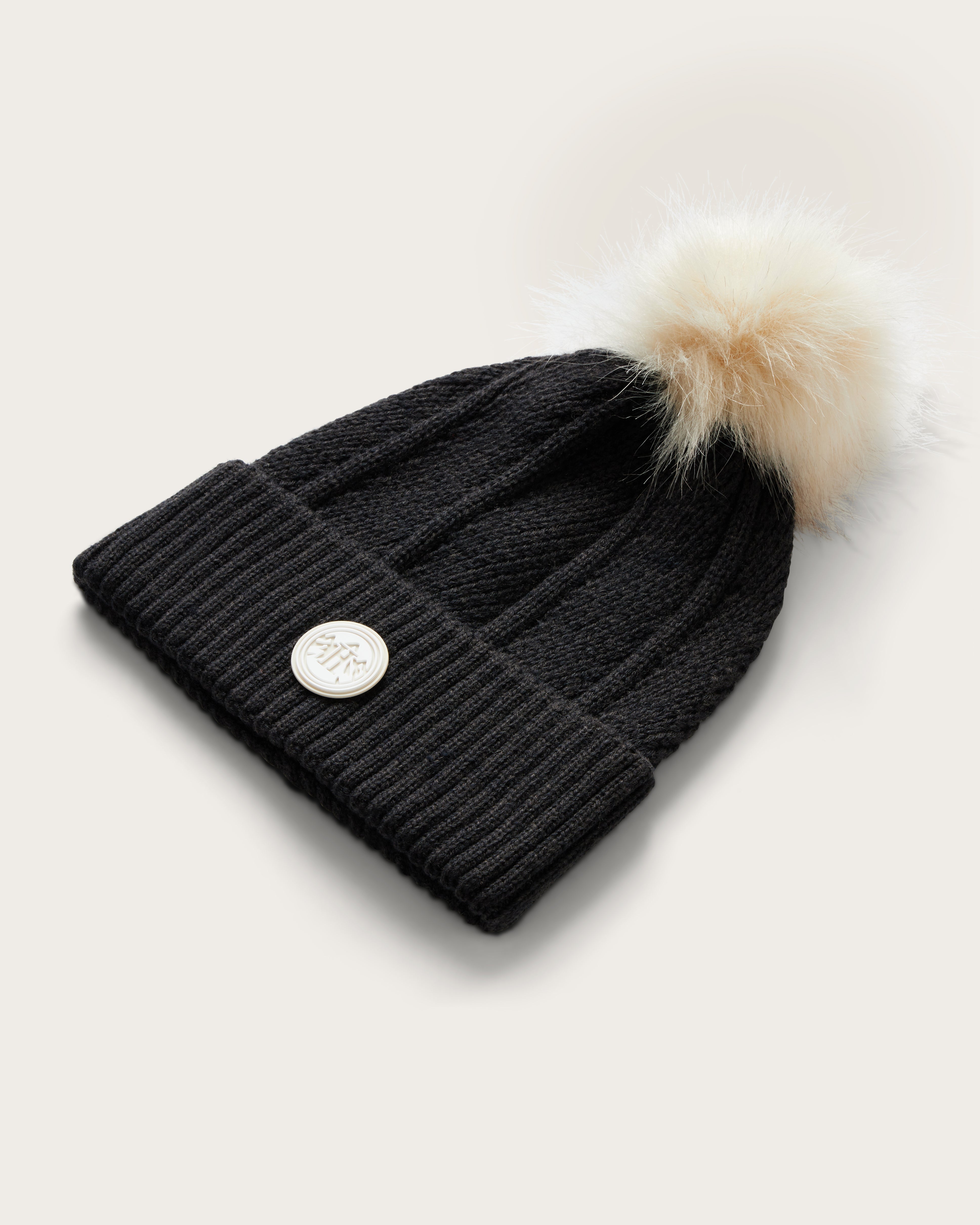 Hemlock Willow Pom beanie in Black with White Pom at an angle