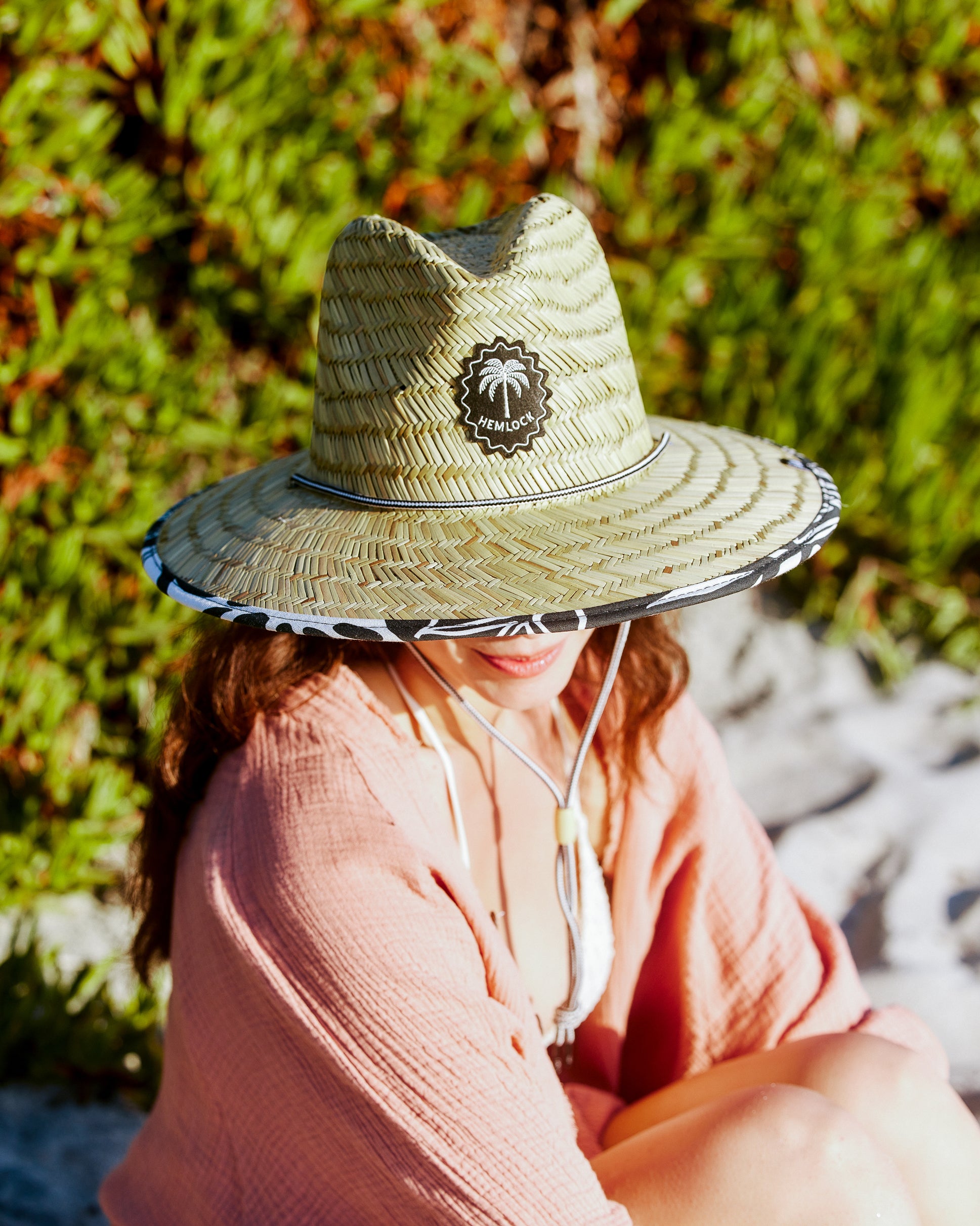 Hemlock female model wearing the UPF50+ Fedora Lifeguard Straw Hat in Monstera print front view