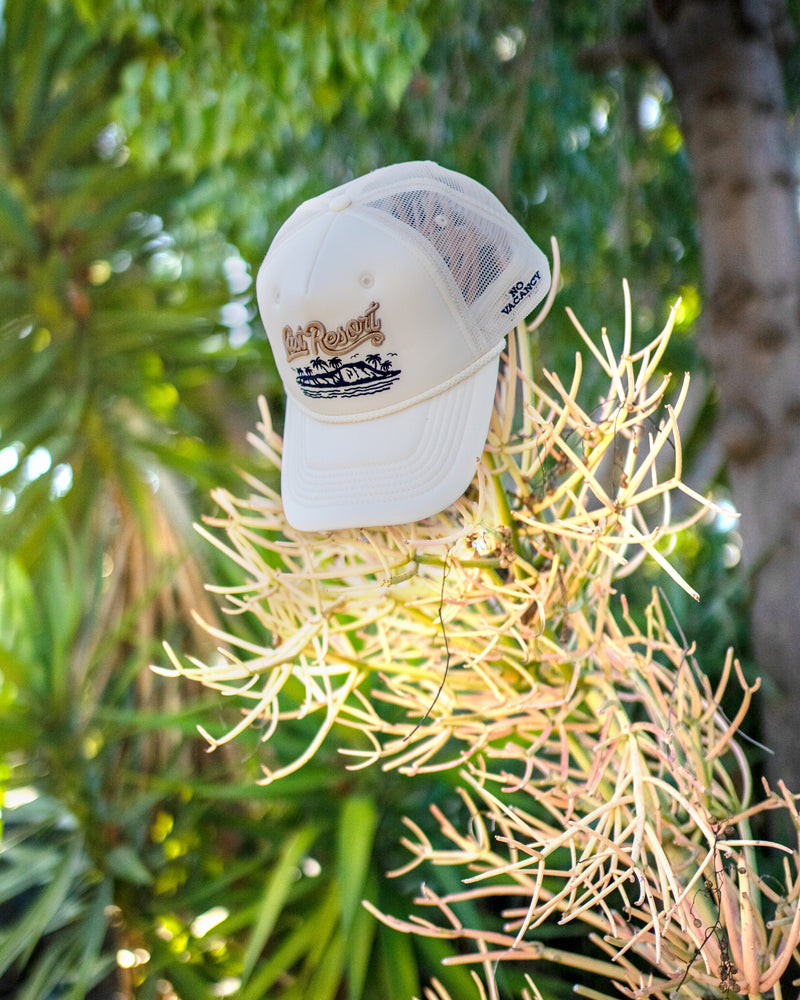 Hemlock Last Resort Foam Trucker in Bone on tree