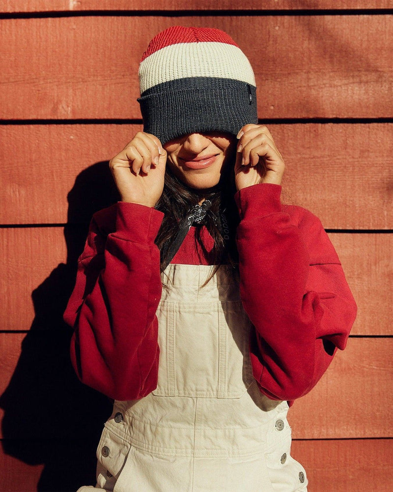 Hemlock female model wearing Ranger Beanie in USA stripe colors over her eyes